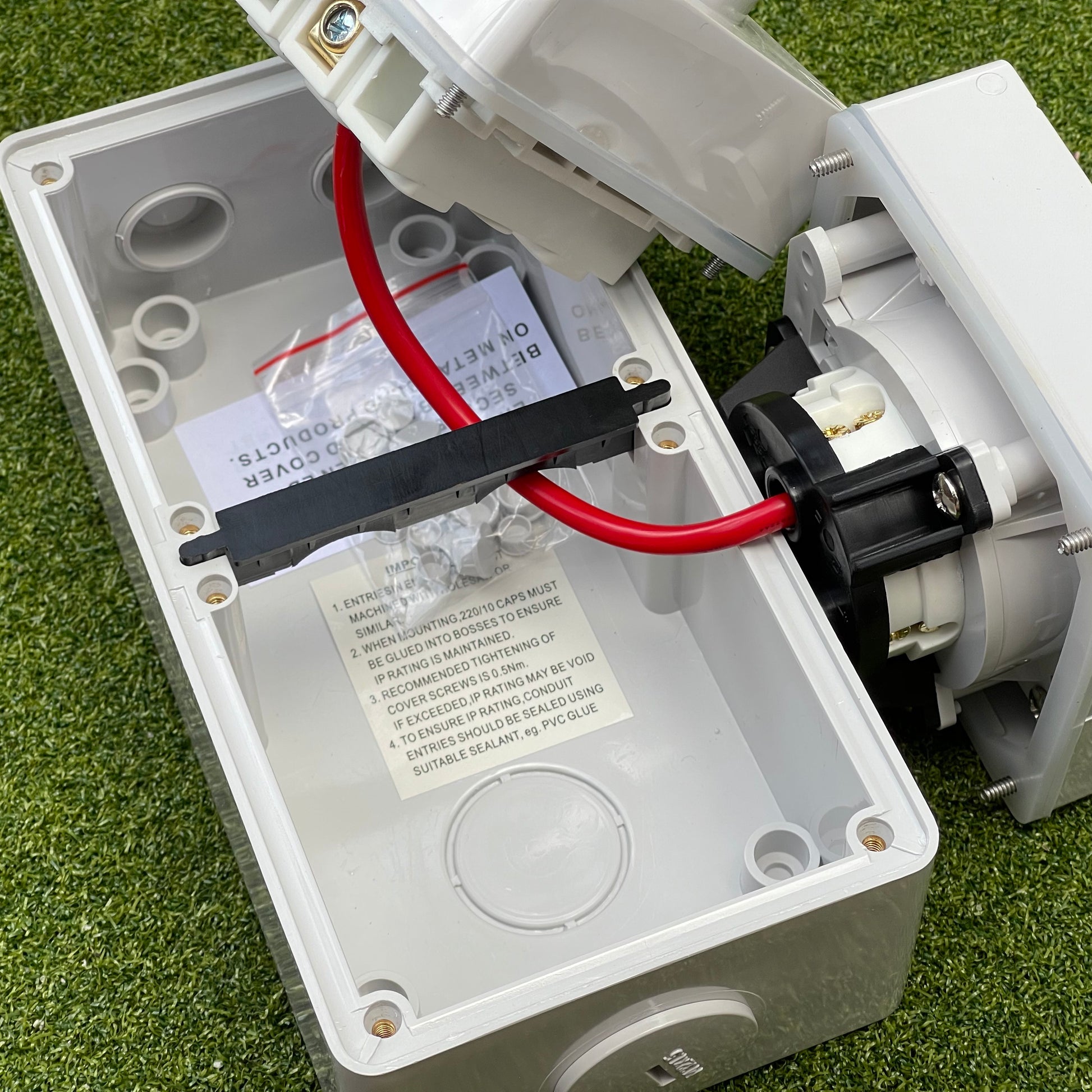 Internal wiring of 32A industrial switched socket IP66 enclosure